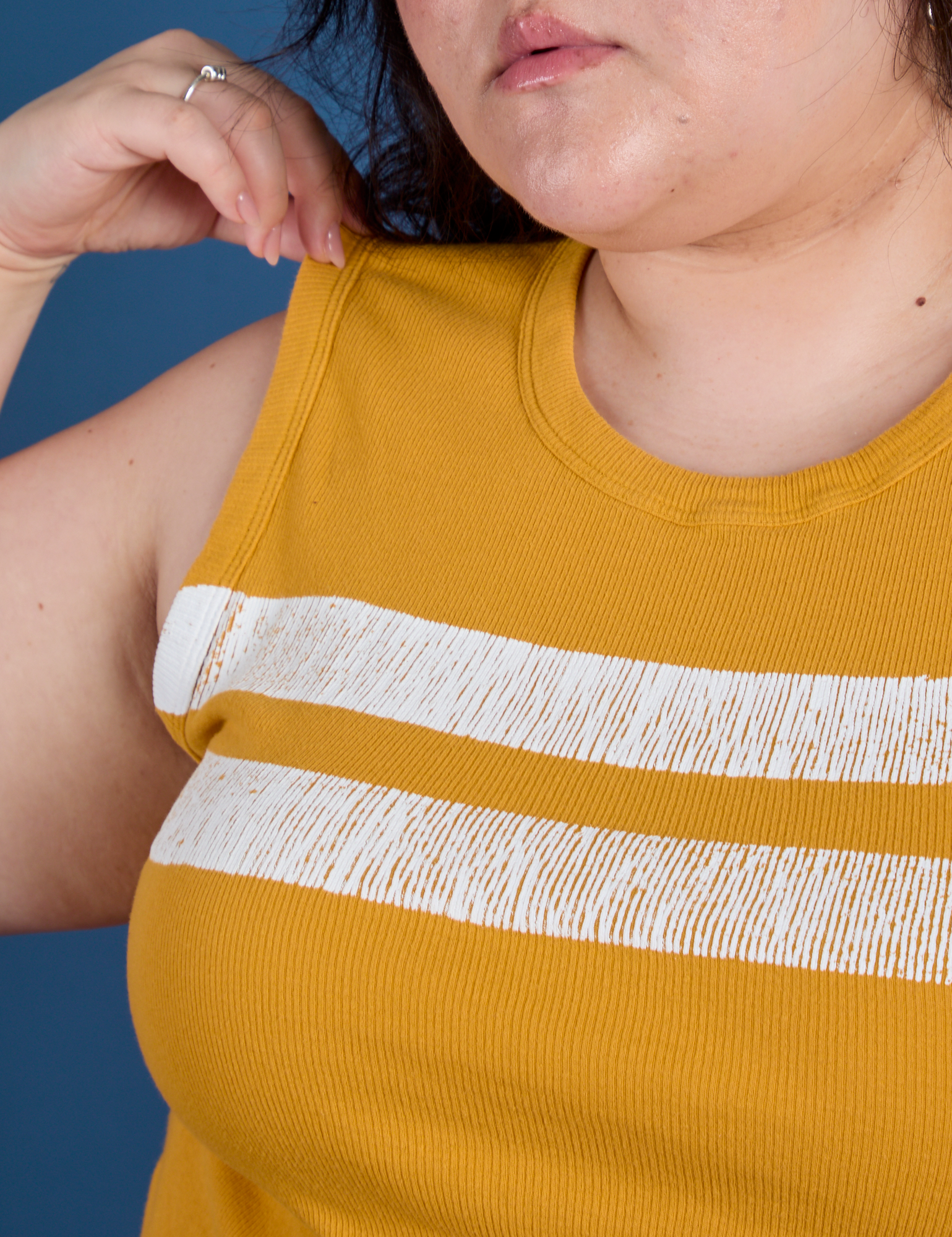 Painted Muscle Tee in Mustard Yellow front close up on Ashley
