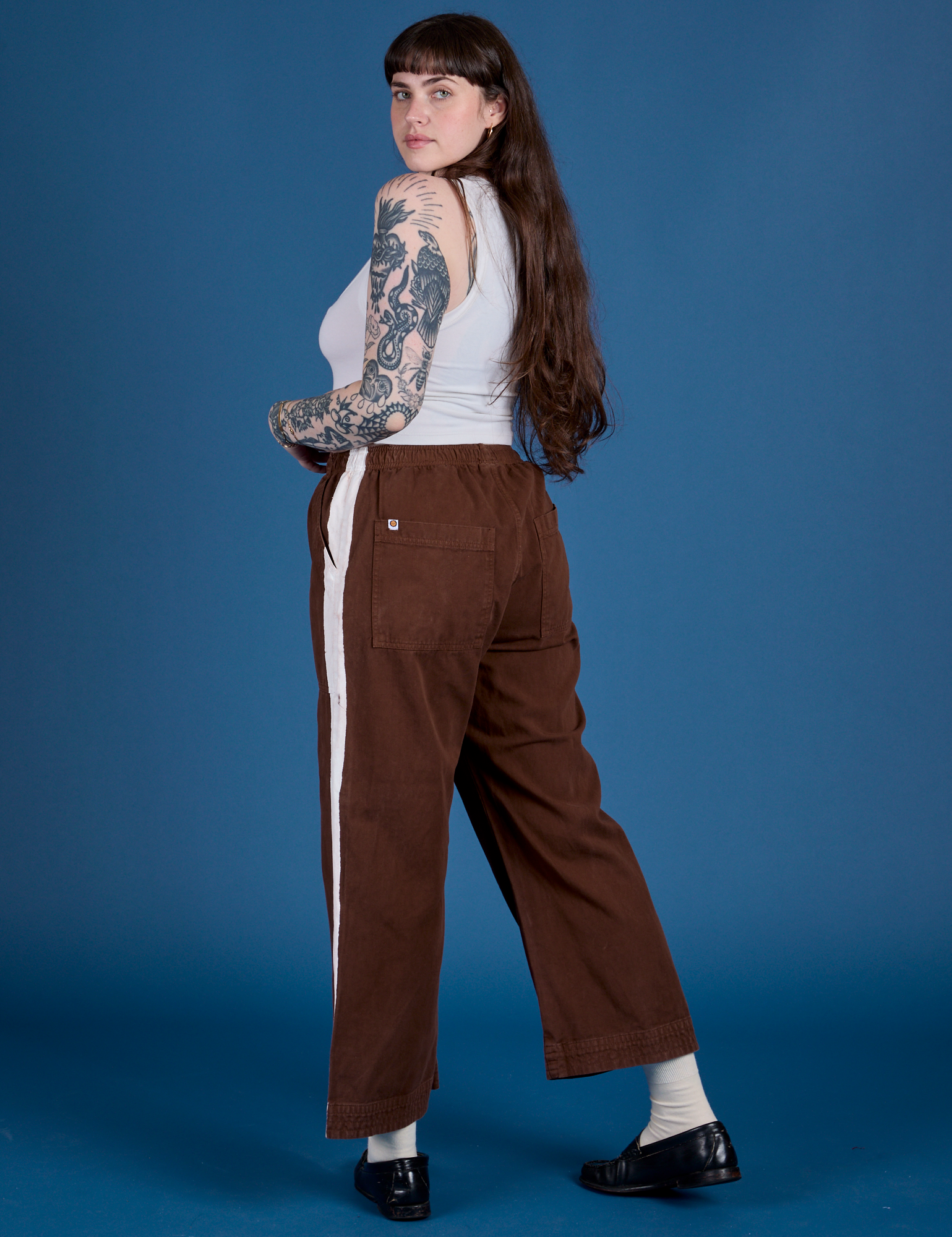 Painted Action Pants in Fudgesicle Brown angled back view on Sydney