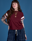 Sydney is 5’9” and wearing XXS Painted Vintage Tee in Red Wine