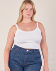 Lish is 5’8” and wearing M Cropped Cami in Vintage Tee Off-White paired with dark wash Carpenter Jeans