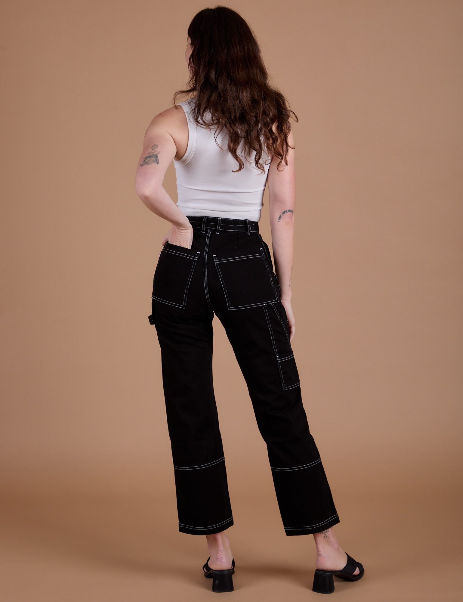 Back view of Carpenter Jeans in Black on Alex