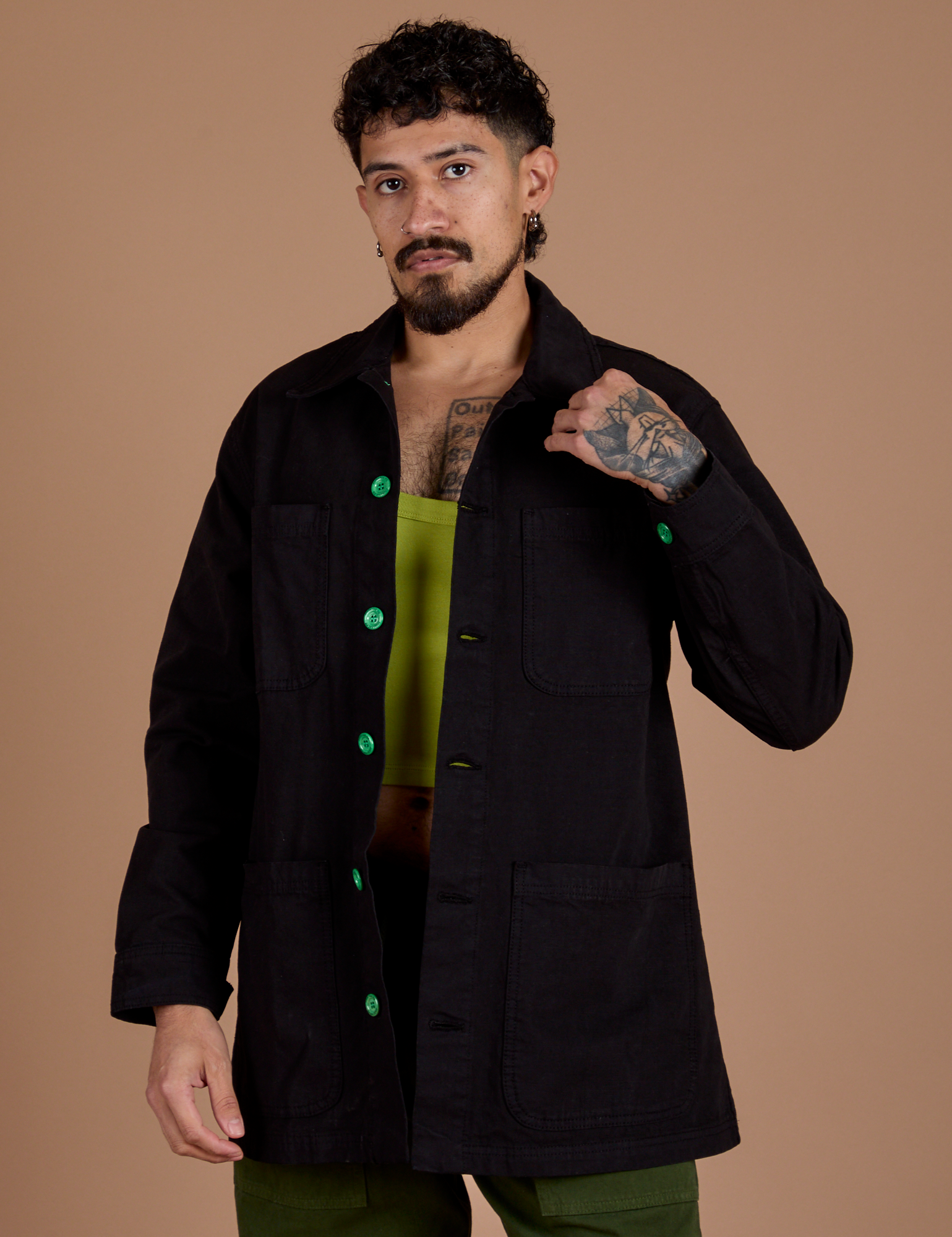 Jesse is 5'8" and wearing XS Ripstop Field Coat in Basic Black
