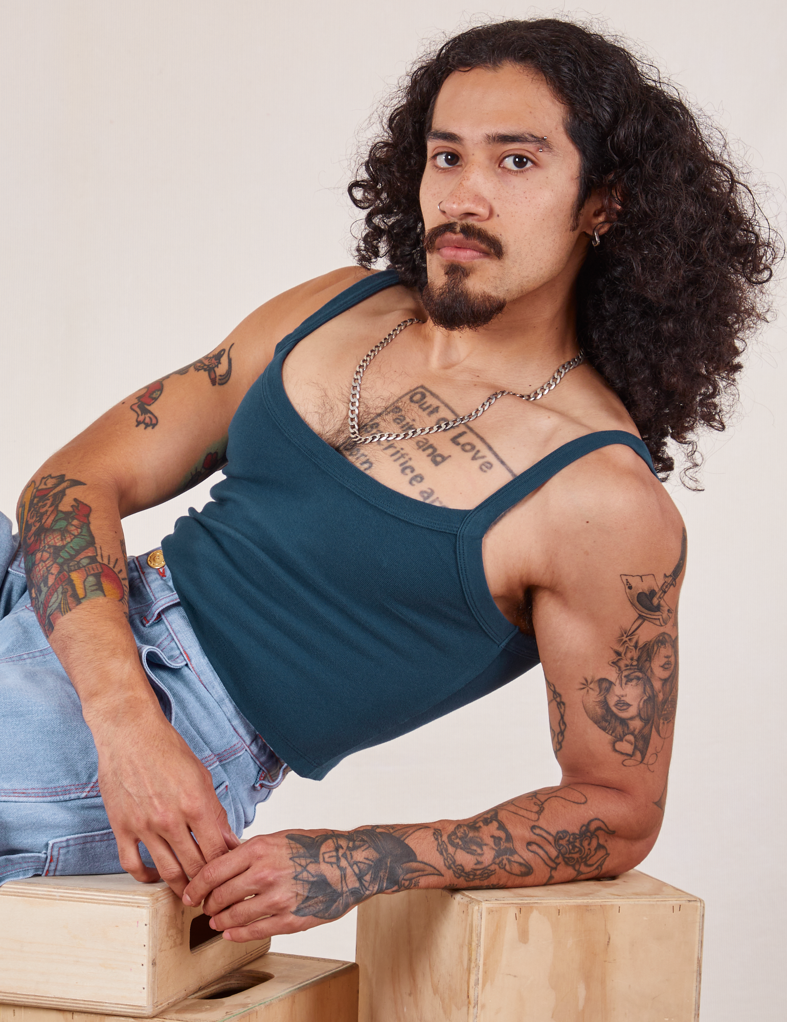 Jesse is wearing Cropped Cami in Lagoon