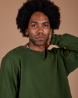 Front close up of Long Sleeve Burly Tee in Evergreen on Jerrod