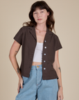 Alex is 5’8” and wearing P Pantry Button-Up in Espresso Brown