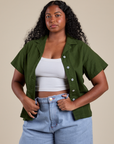 Meghna is 5’8” and wearing M Pantry Button-Up in Evergreen