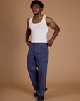 Railroad Denim Work Pants in Faded Grape Overdye and vintage tee off-white Tank Top on Isaac