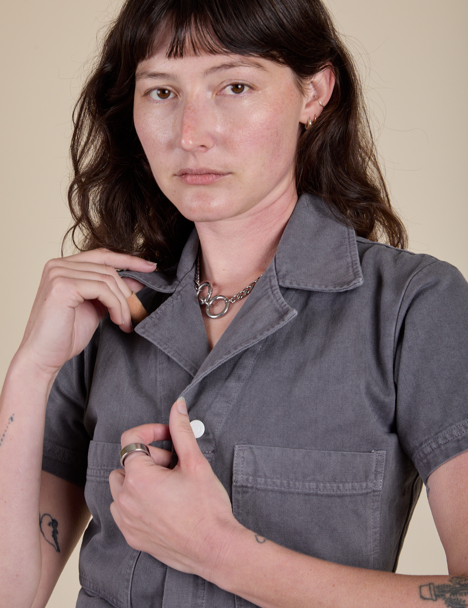 Front close up of Short Sleeve Jumpsuit in Washed Grey on Alex