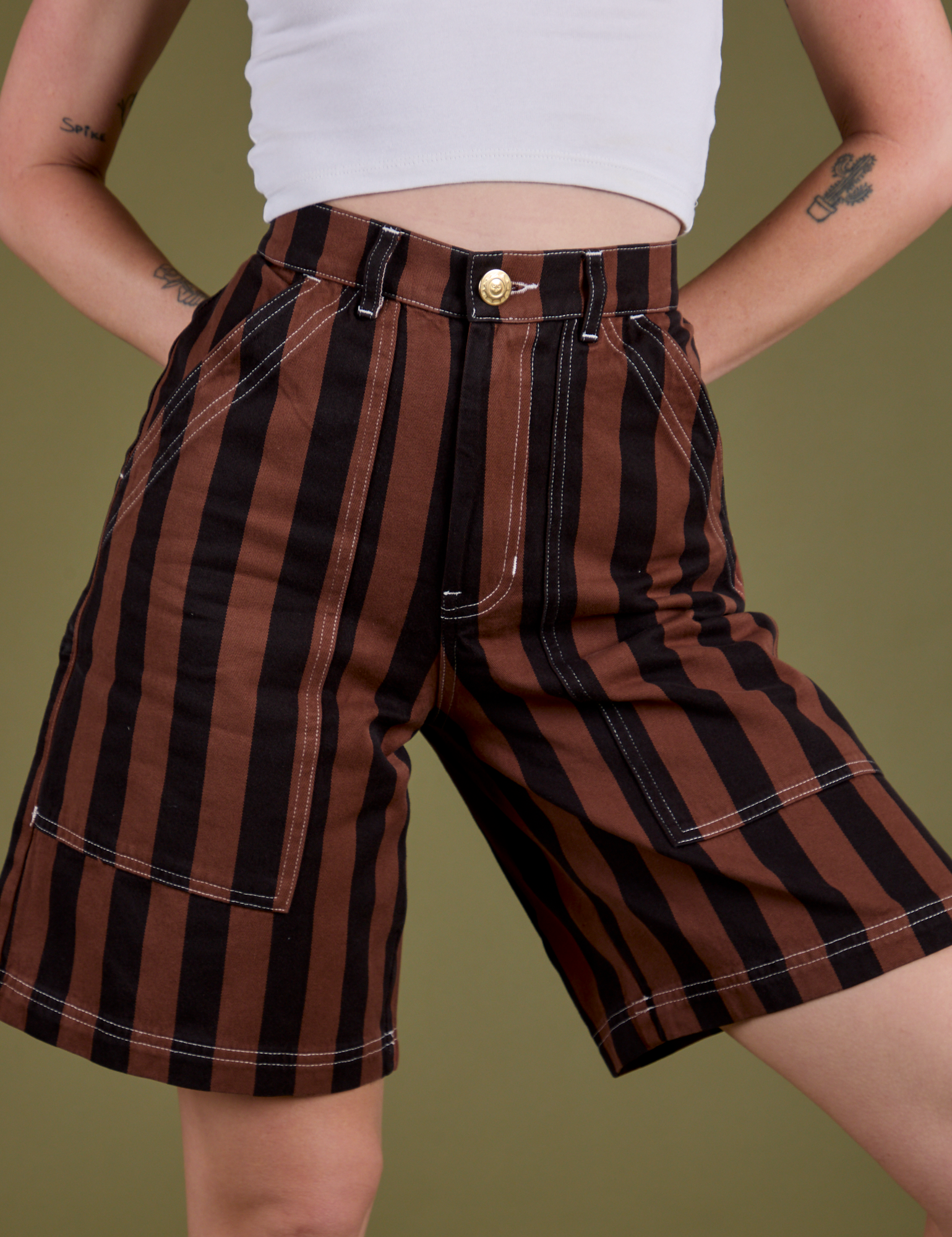 Longline Work Shorts in Fudgesicle Brown close up on Alex
