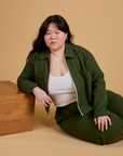 Ashley is wearing Heritage Mechanic Jacket in Evergreen