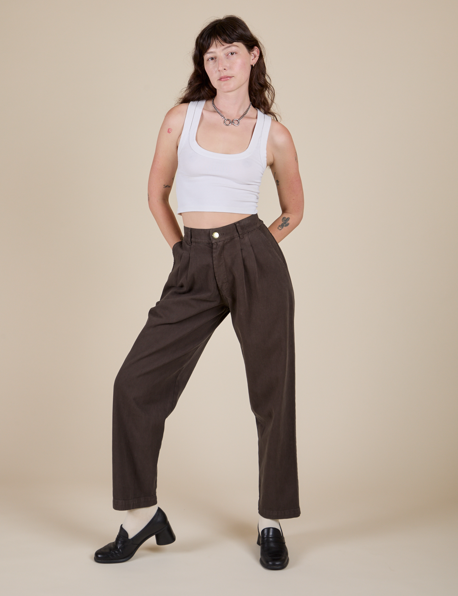 Alex is 5'8" and wearing XXS Heavyweight Trousers in Espresso Brown paired with a Cropped Tank in Vintage Tee White