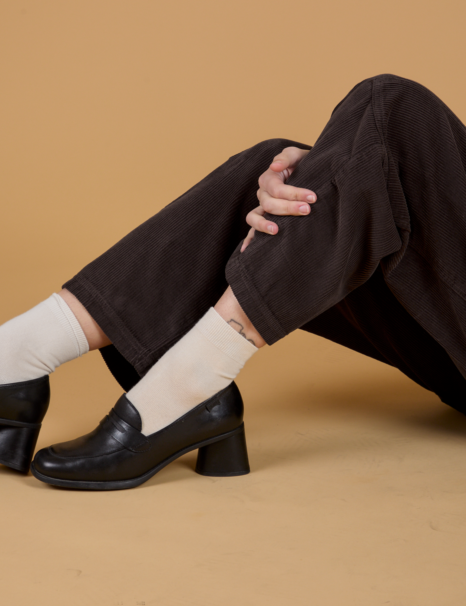 Corduroy Drop Pocket Cargo Pants in Espresso Brown pant leg close up on Alex