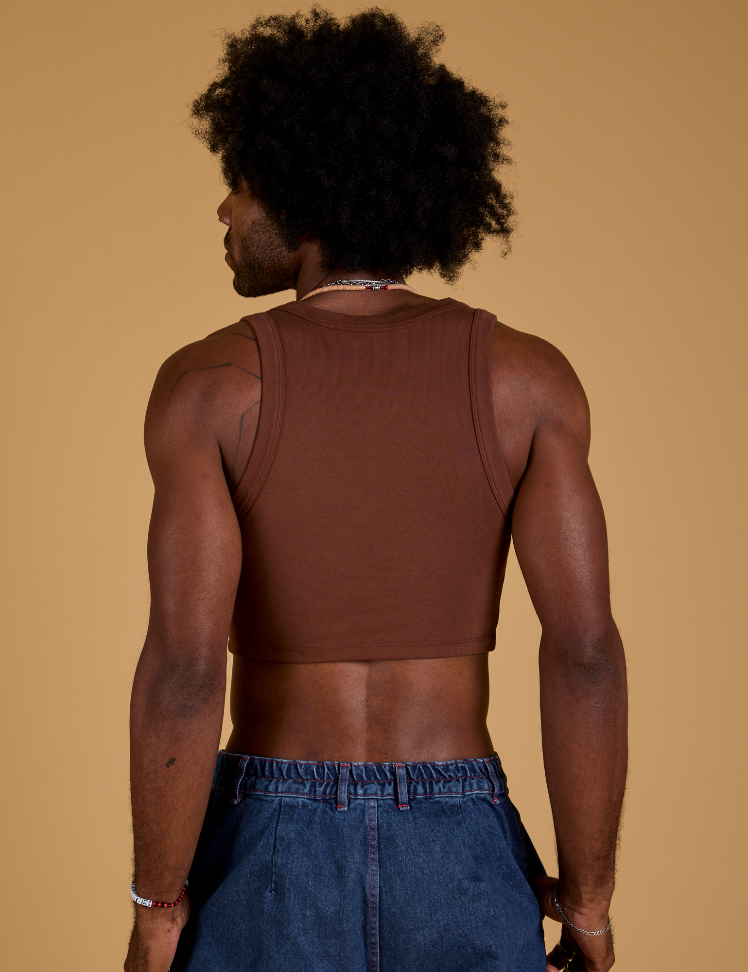 Mini Tank in Fudgesicle Brown back view on Jerrod