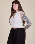 Angled front view of Muscle Tee in Vintage Tee White on Sydney