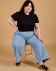 Organic Vintage Tee in Basic Black and light wash Indigo Wide Leg Trousers worn by Ashley