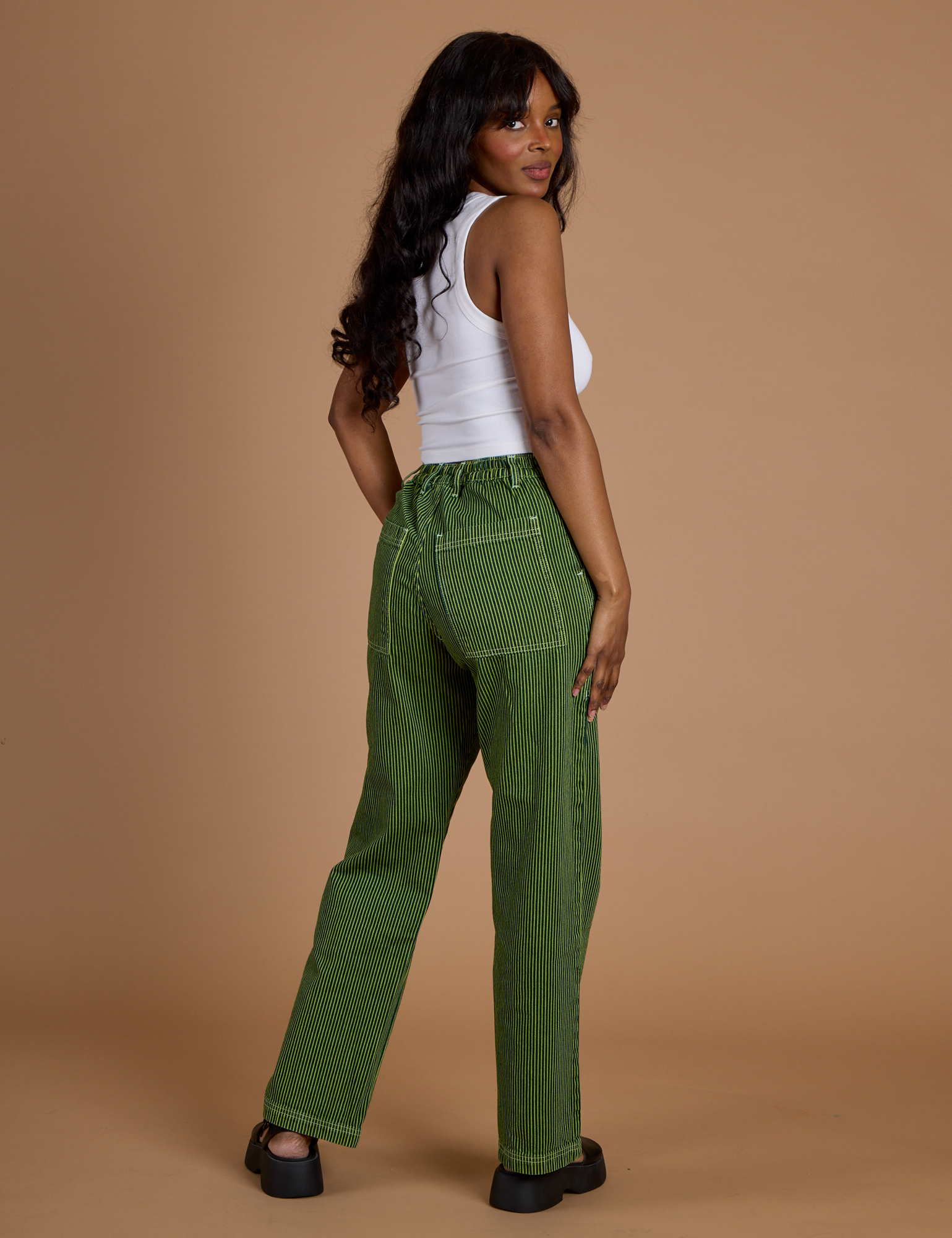 Railroad Denim Work Pants in Gross Green Overdye angled back view on Kandia
