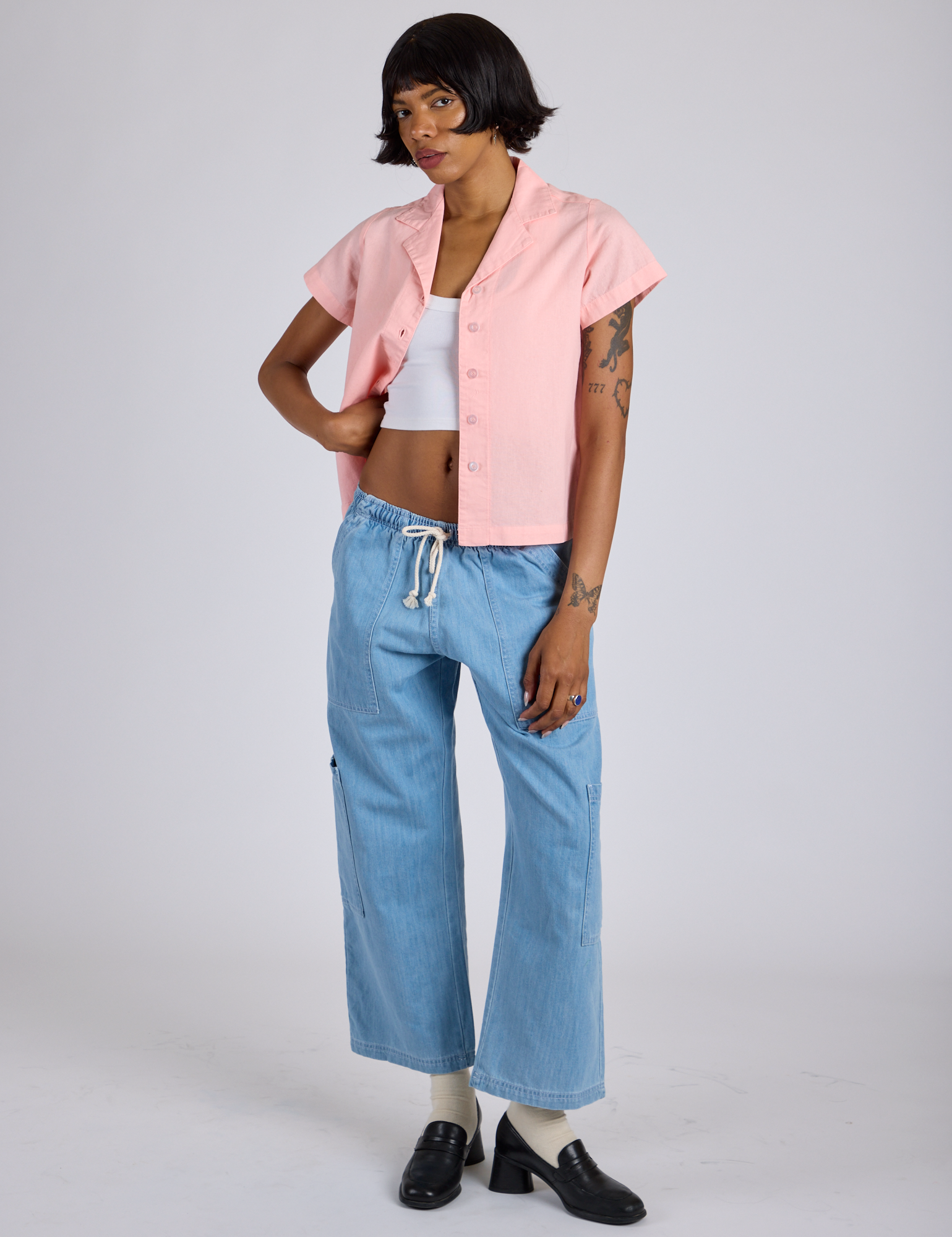 Pantry Button-Up in Baby Pink and light wash Denim Drop Pocket Pants on Kira