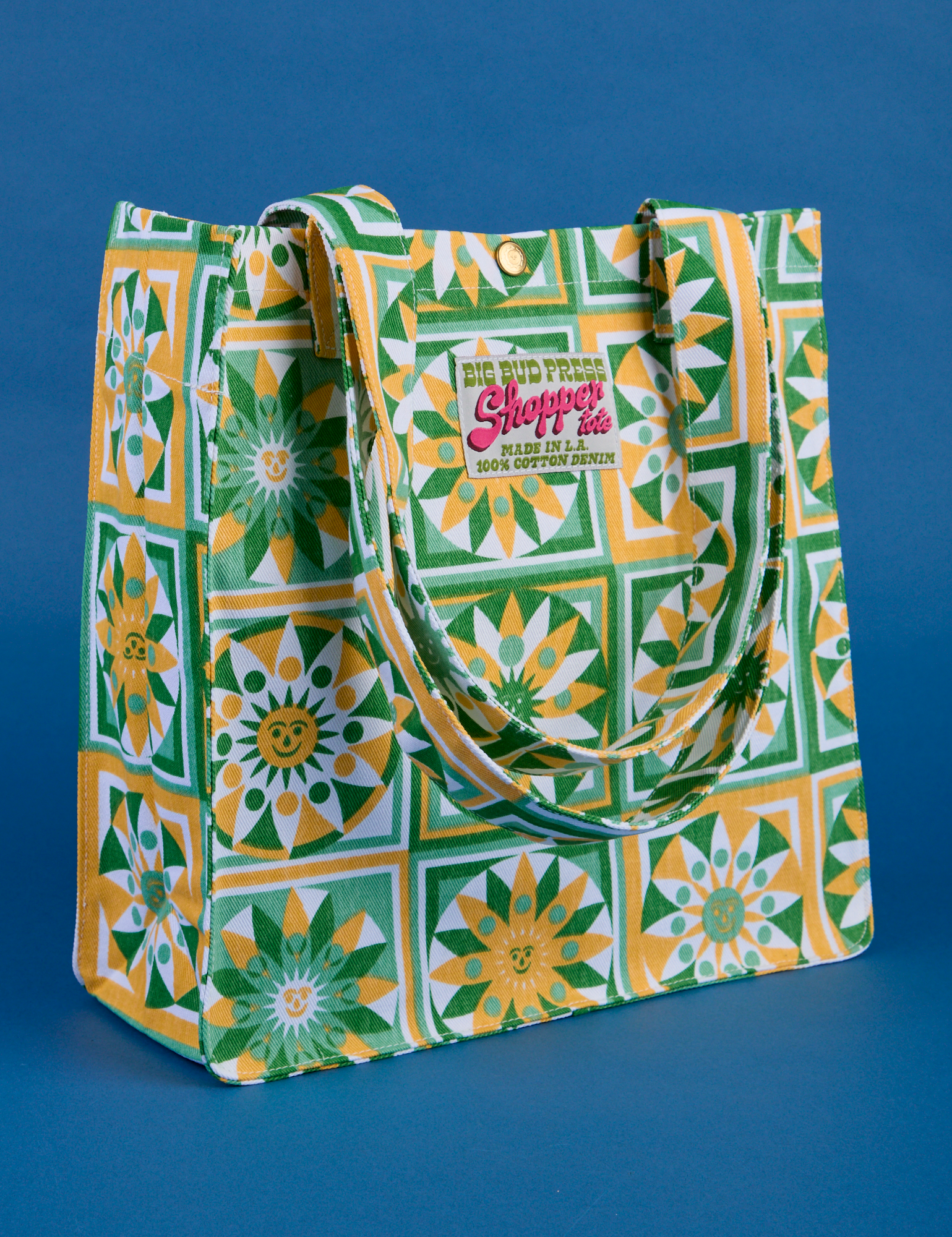 Angled front view of Spring Quilt Printed Shopper Tote