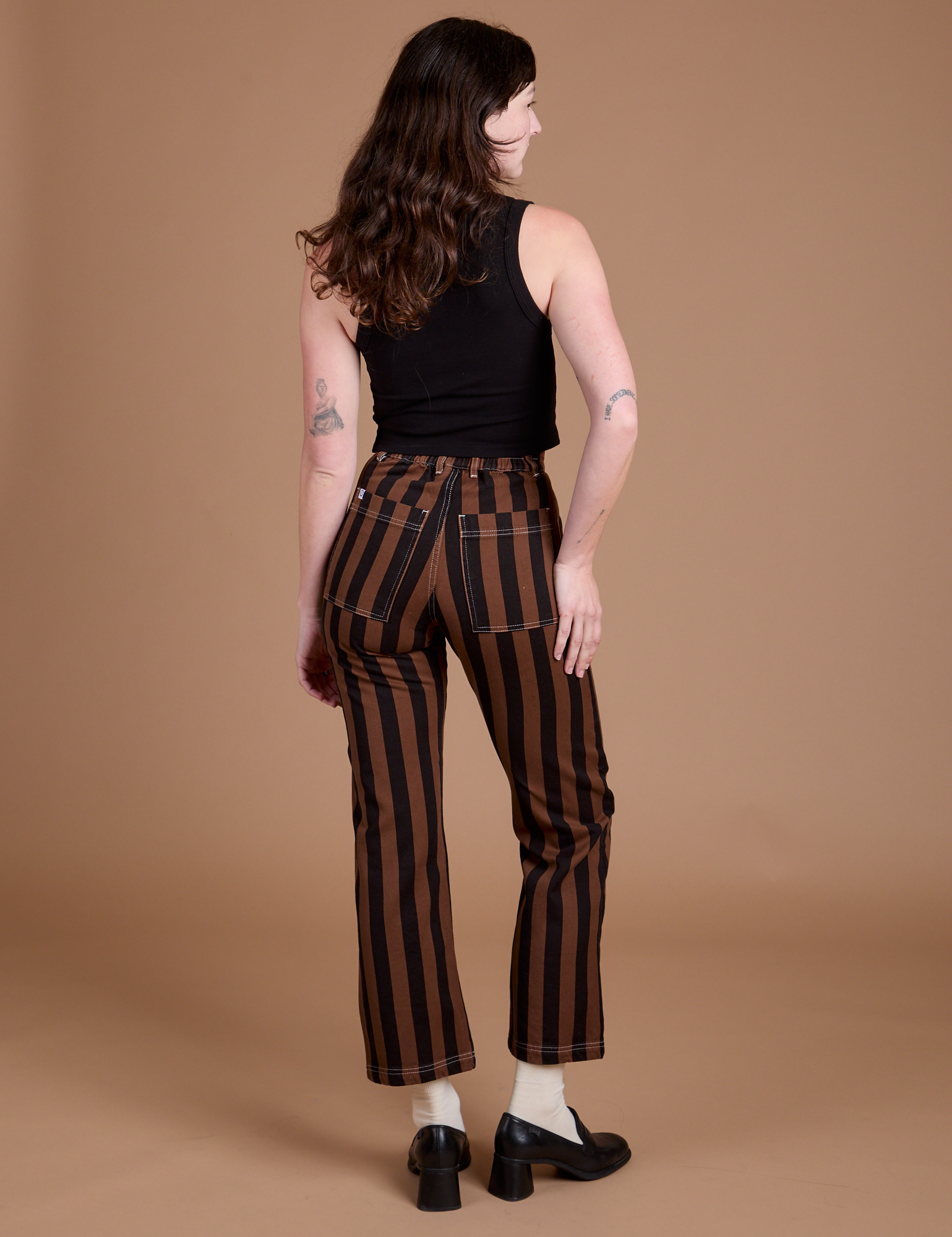 Back view of Black Stripe Work Pants in Fudgesicle Brown on Alex