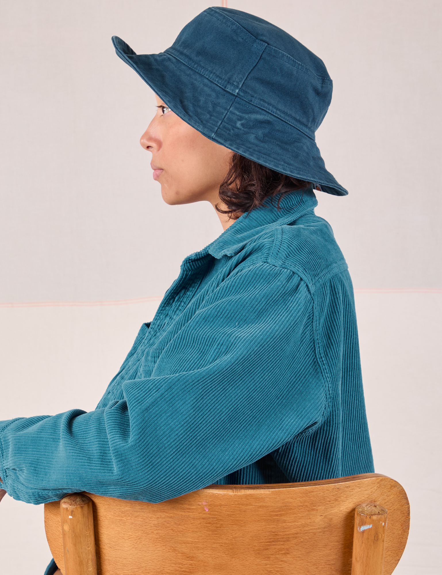 Tiara is wearing Wide Brim Denim Bucket Hats