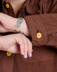 Ripstop Field Coat in Fudgesicle Brown sleeve close up on Sam