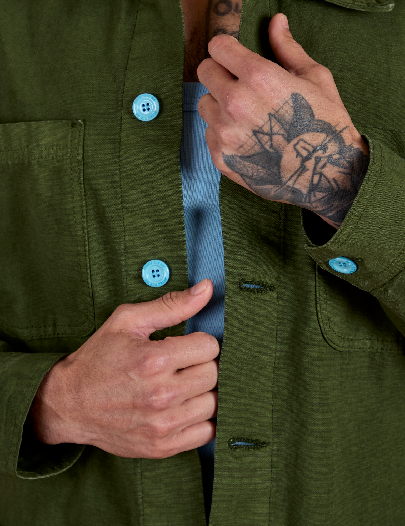 Front close up of Ripstop Field Coat in Evergreen on Jesse