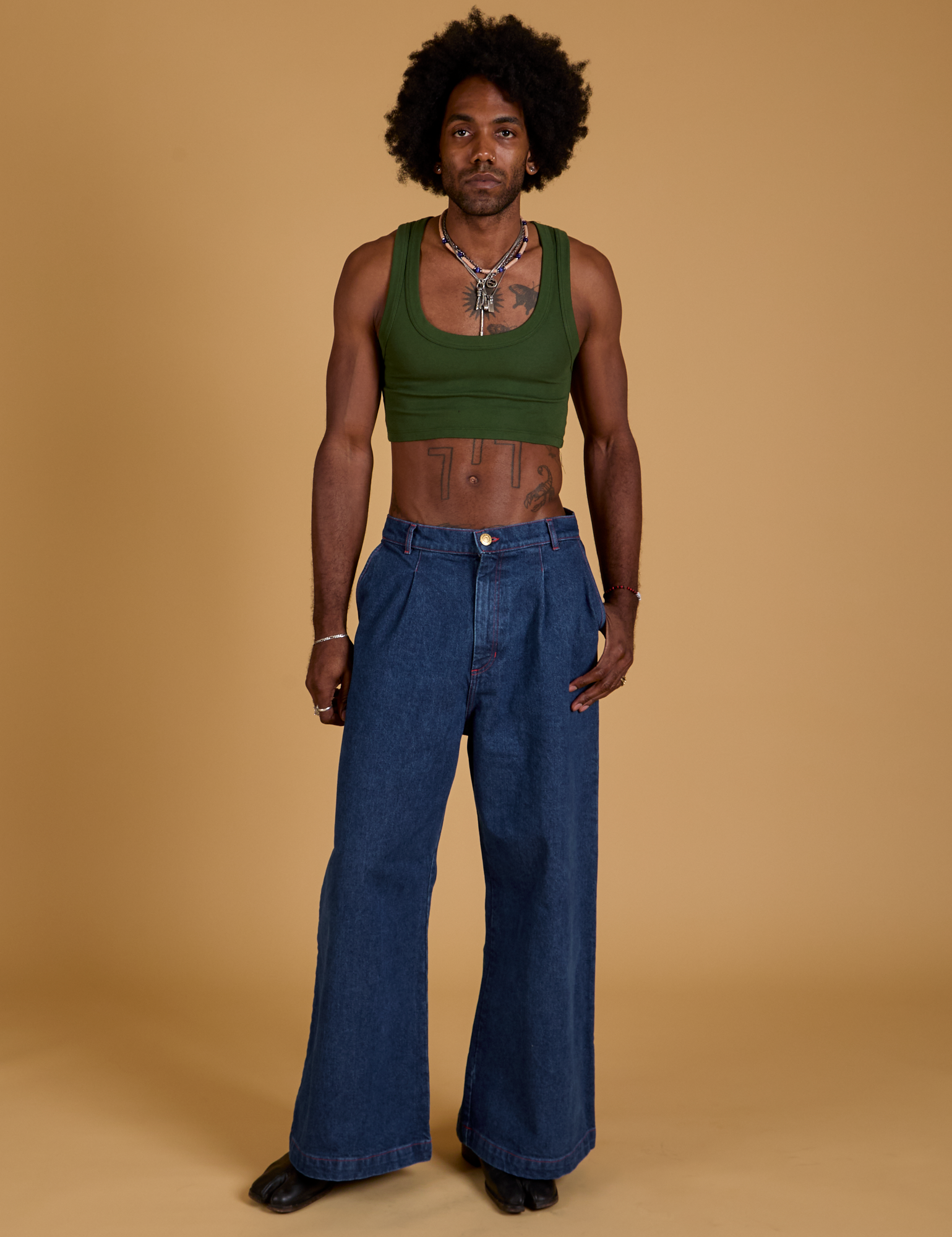 Mini Tank in Evergreen and dark wash Indigo Wide Leg Trousers worn by Jerrod