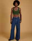 Mini Tank in Evergreen and dark wash Indigo Wide Leg Trousers worn by Jerrod