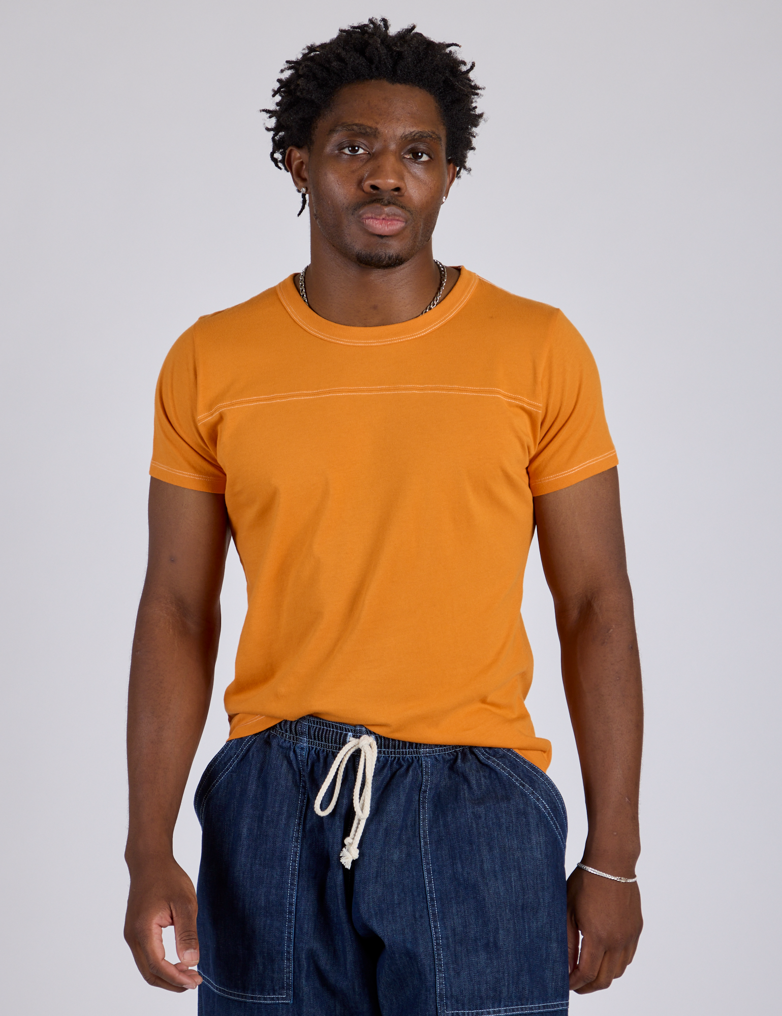Jr. Varsity Tee in Creamsicle Orange on Isaac