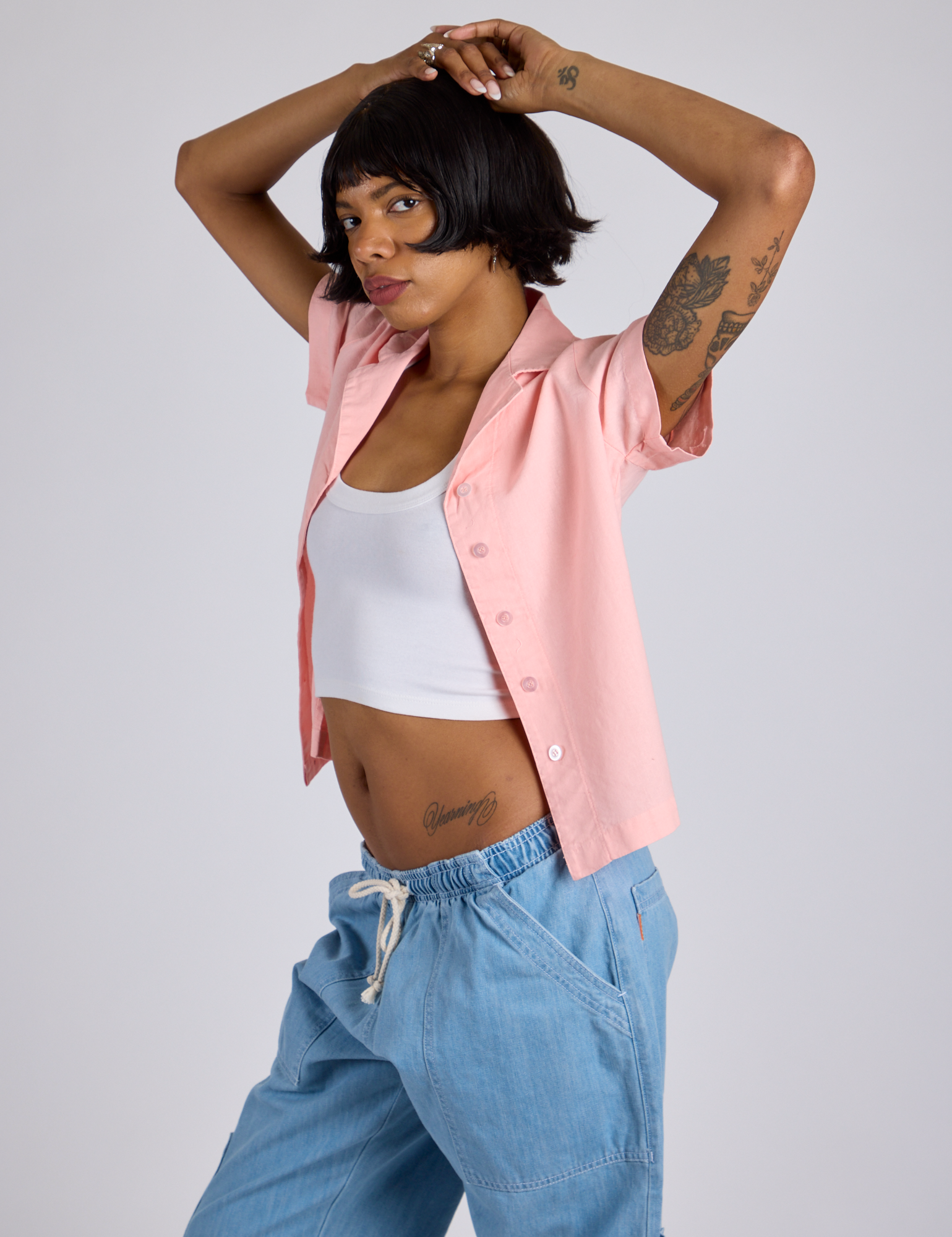 Pantry Button-Up in Baby Pink side view on Kira