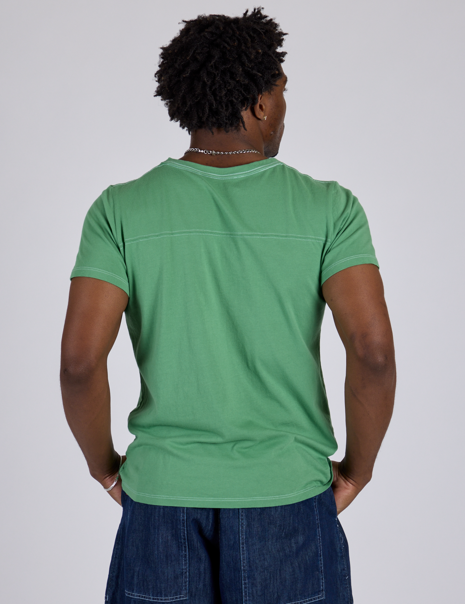 Jr. Varsity Tee in Seafoam Green back view on Isaac