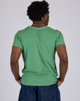 Jr. Varsity Tee in Seafoam Green back view on Isaac