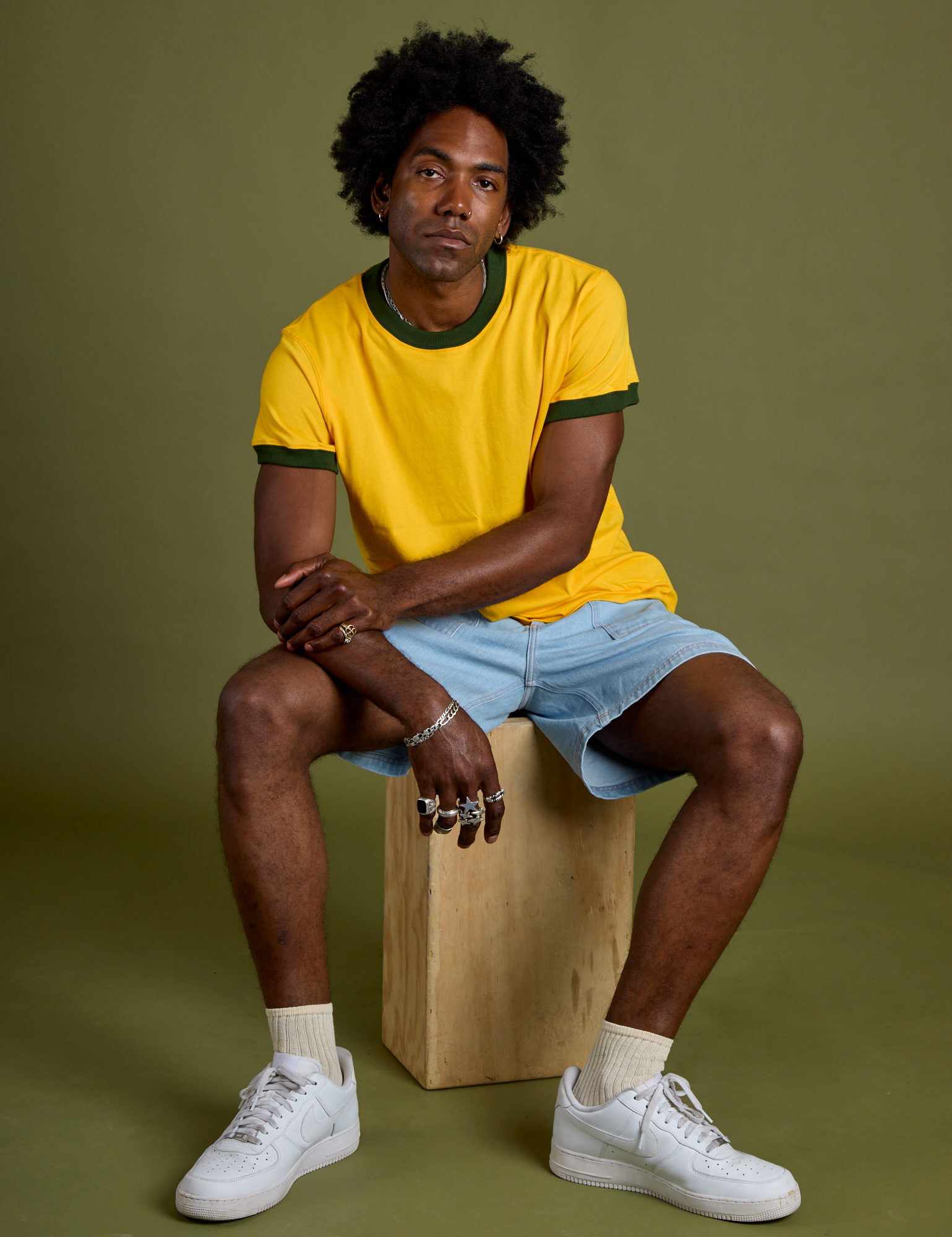 Vintage Ringer Tee in Sunshine Yellow and light wash Carpenter Shorts on Jerrod