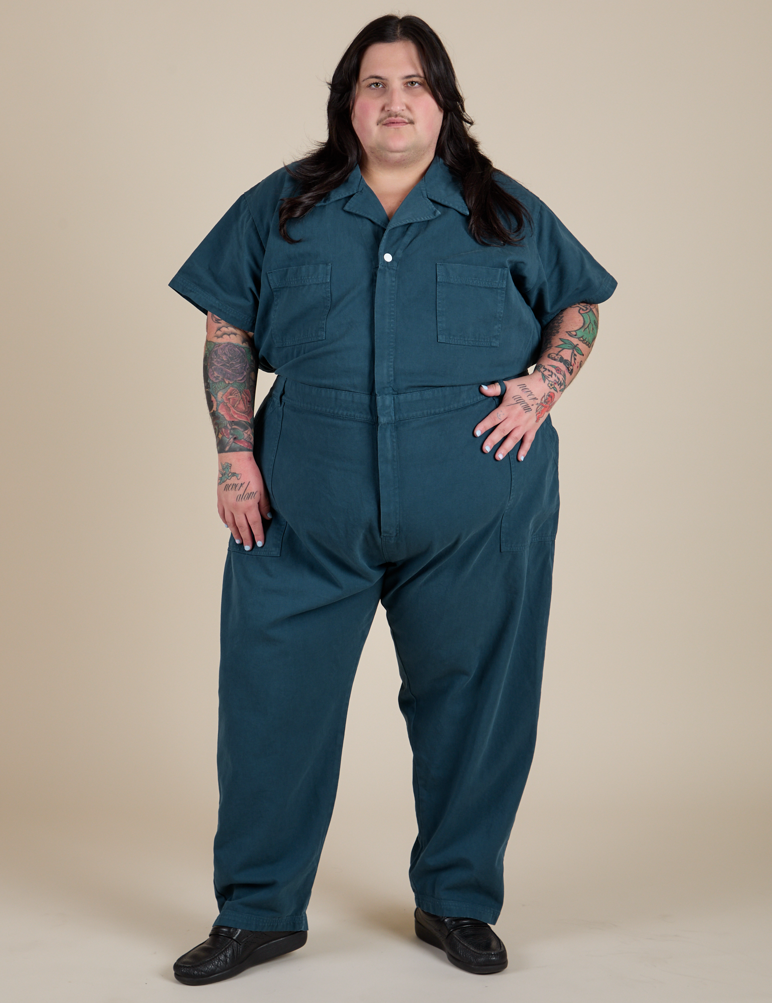 Sam is 5'10" and wearing 4XL Short Sleeve Jumpsuit in Lagoon