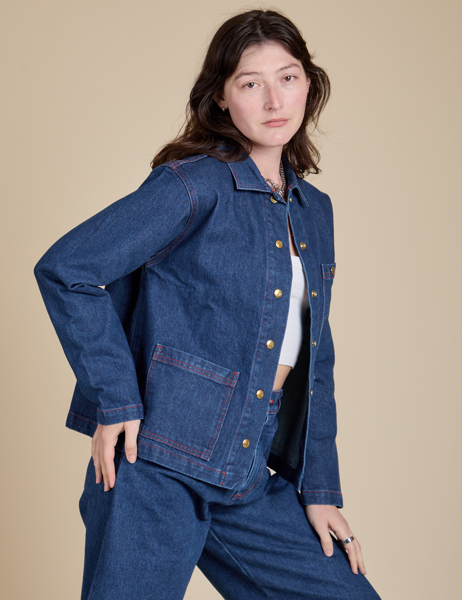 Front angled view of Indigo Denim Work Jacket in Dark Wash on Alex