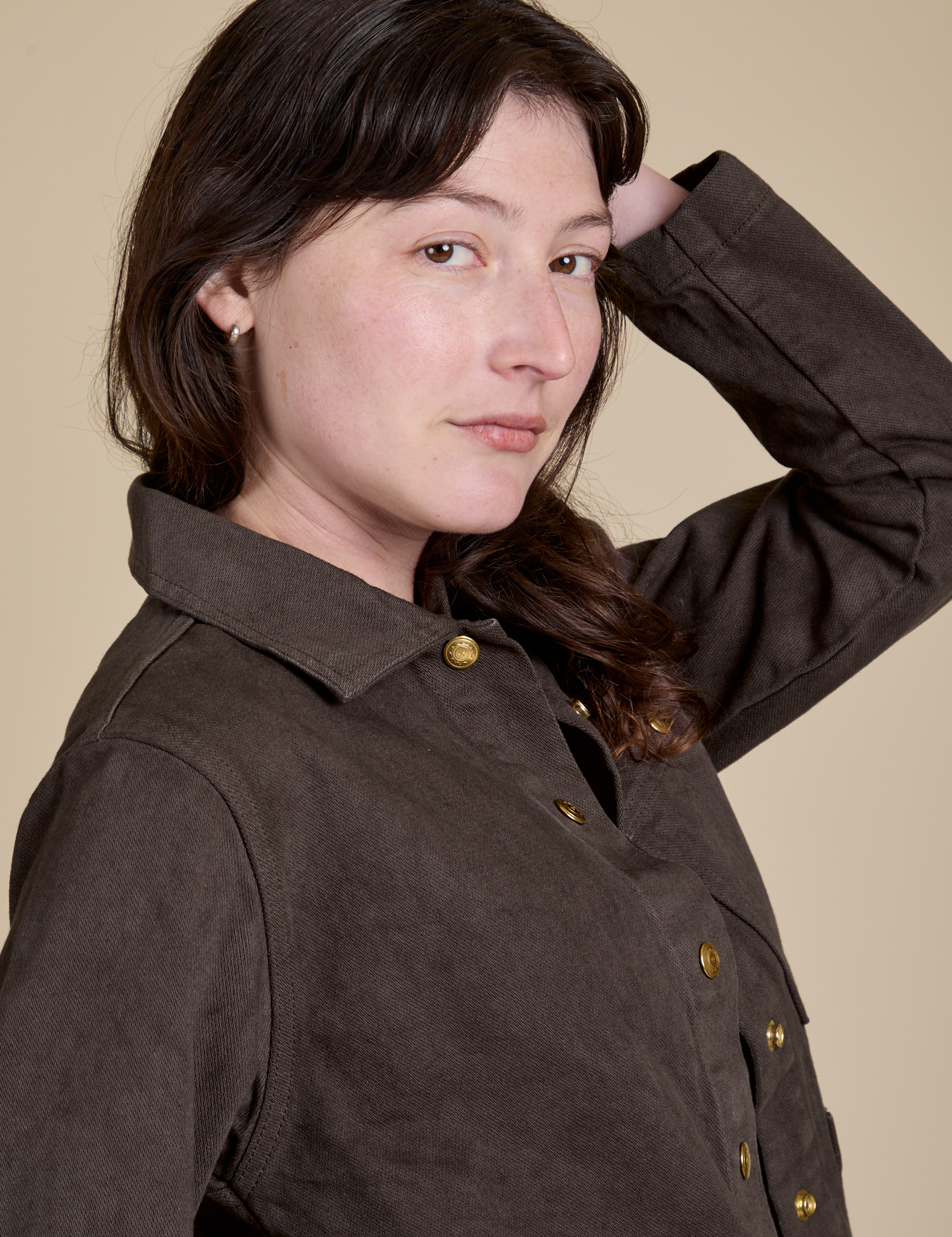 Side close up of Denim Work Jacket in Espresso Brown on Alex