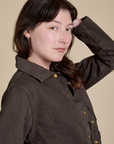 Side close up of Denim Work Jacket in Espresso Brown on Alex