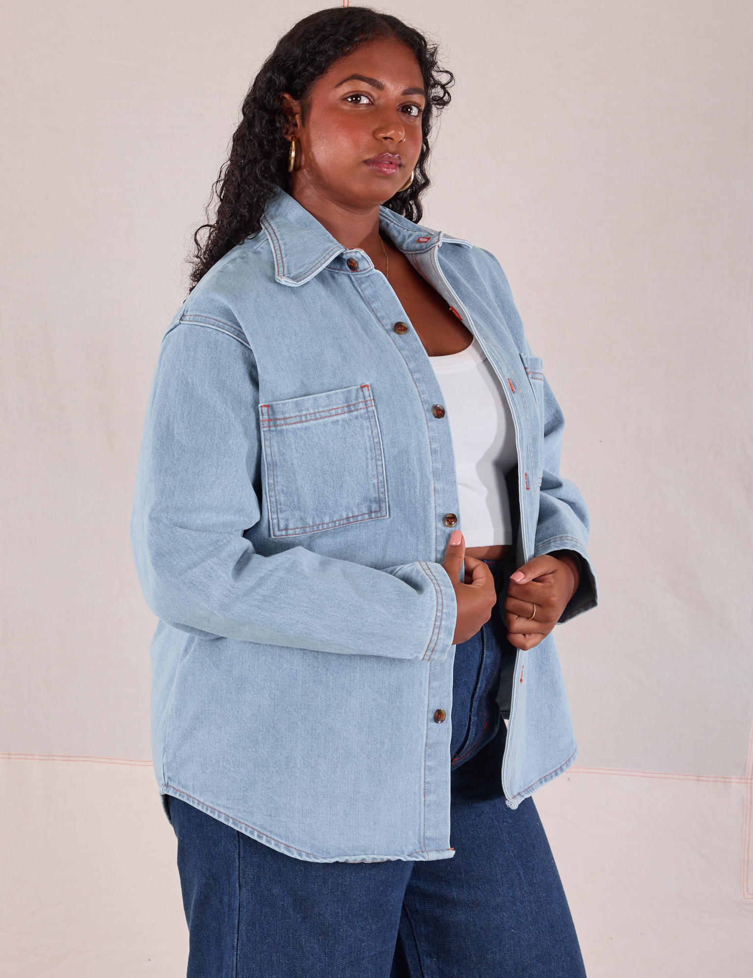 Denim Overshirt in Light Wash angled front view on Meghna