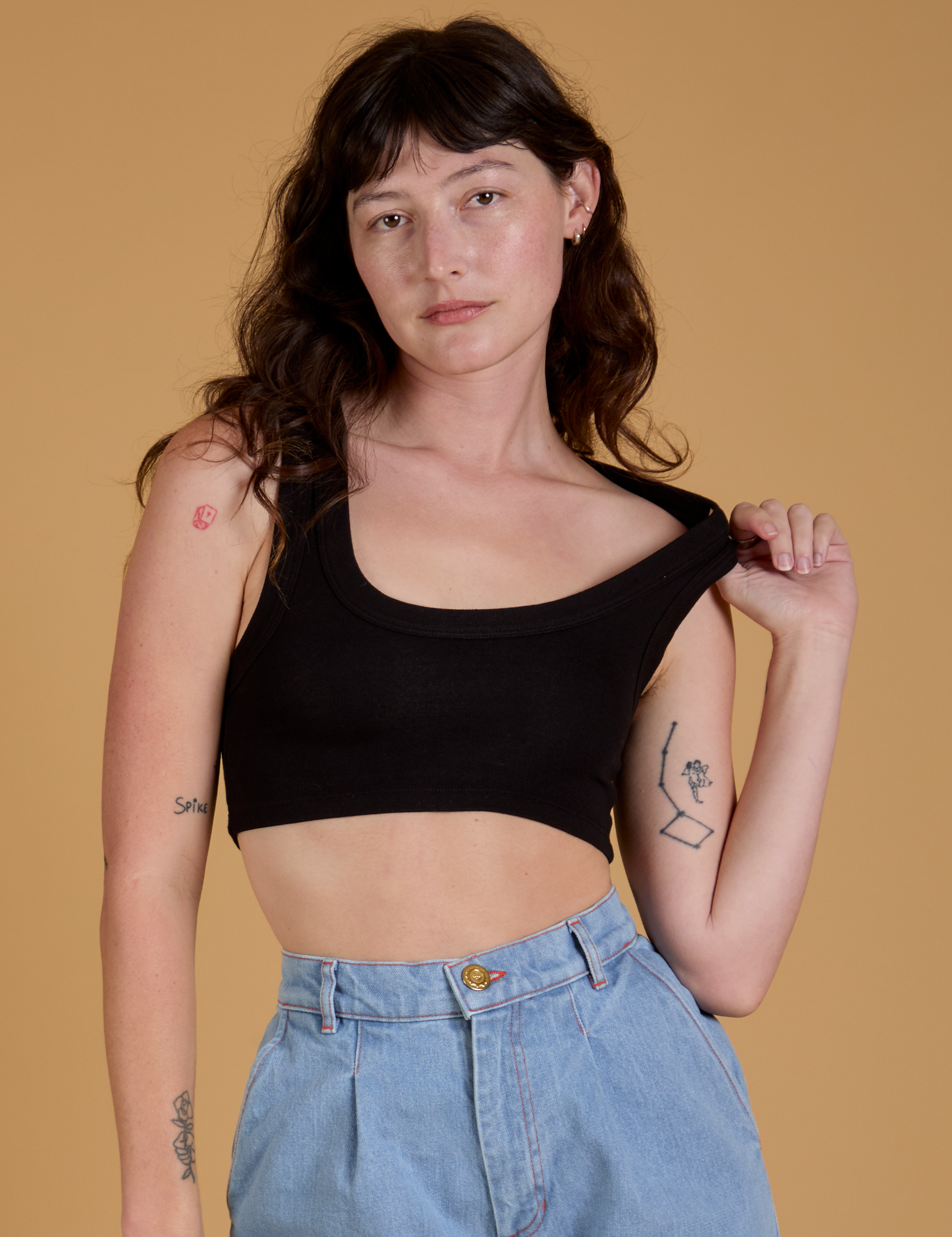 Alex is wearing Mini Tank in Basic Black