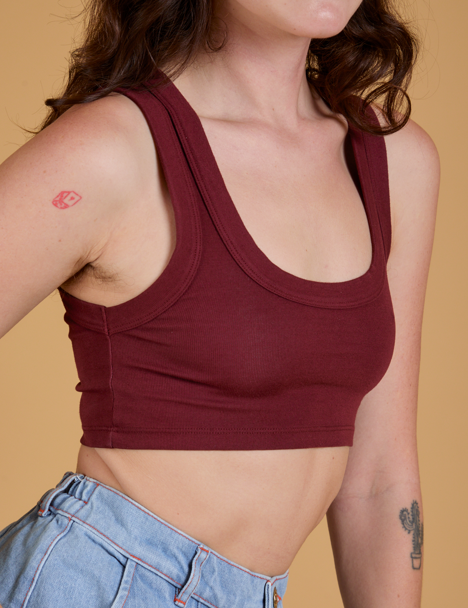 Close up of Mini Tank in Red Wine worn by Alex