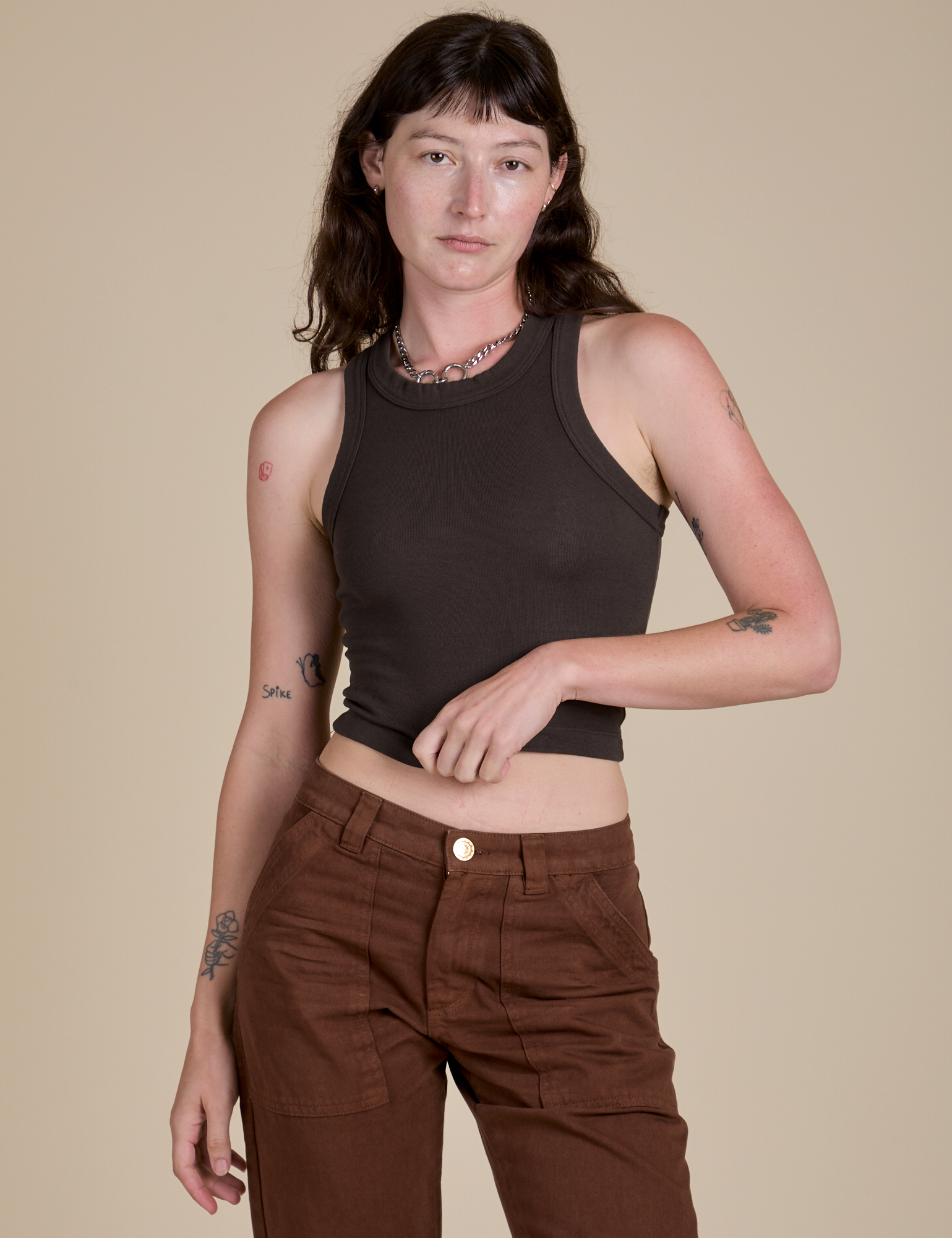 Alex is 5’8” and wearing P Racerback Tank in Espresso Brown