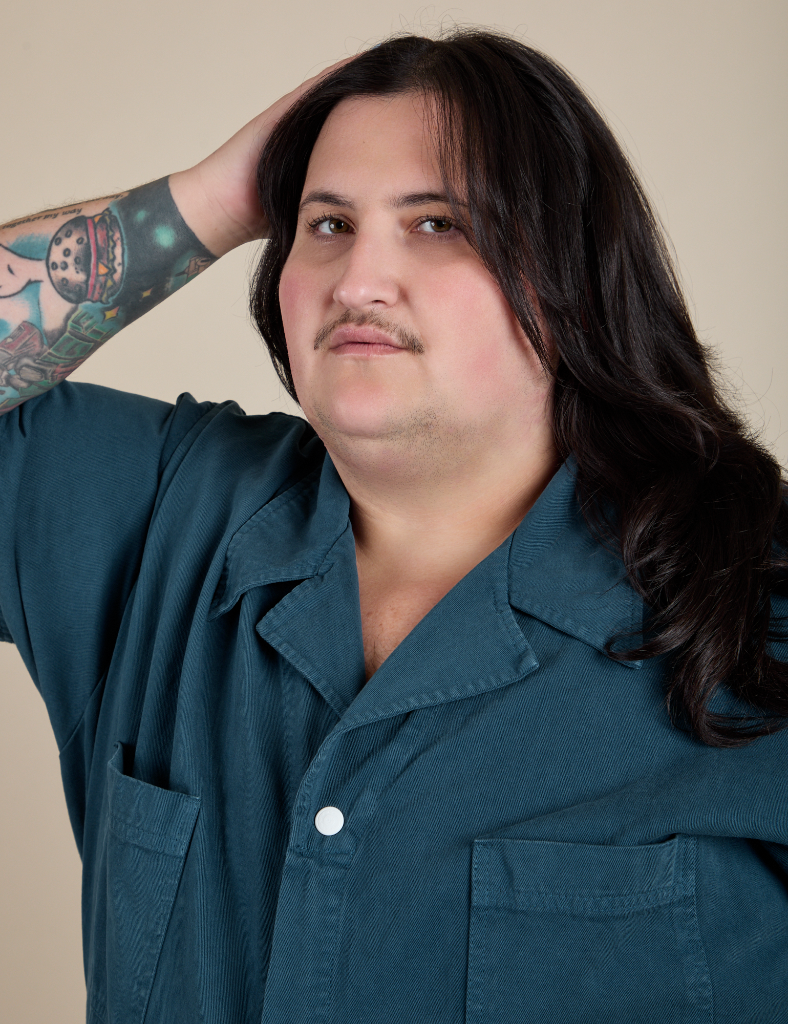 Front close up of Short Sleeve Jumpsuit in Lagoon on Sam