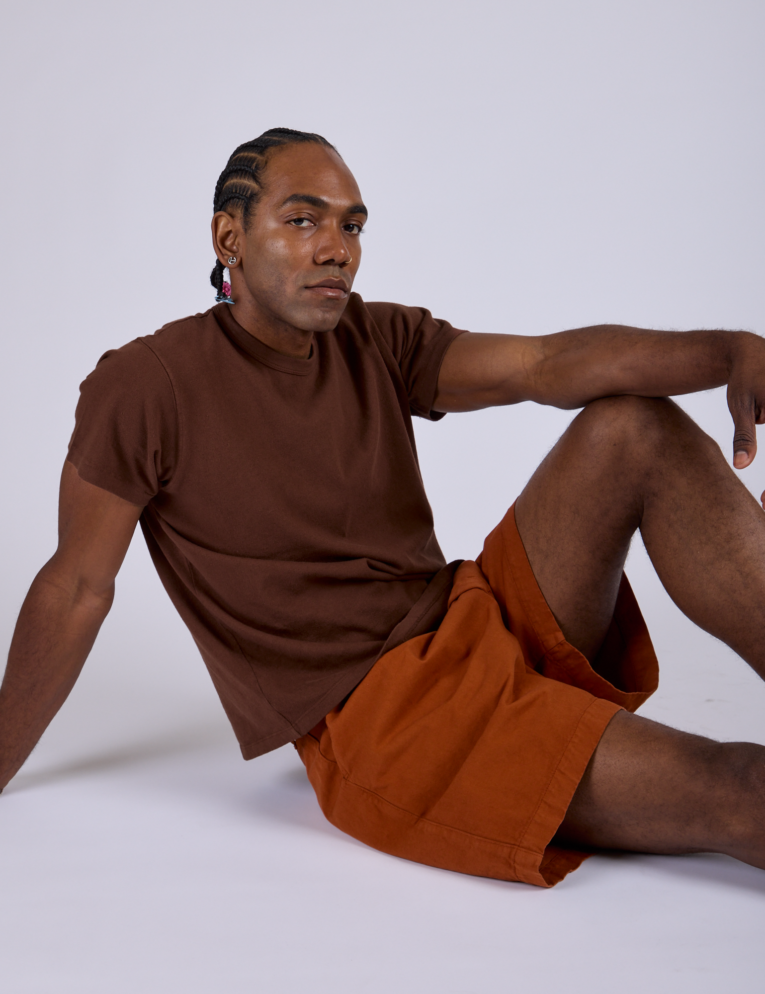 Pleated Trouser Shorts in Burnt Terracotta and Organic Vintage Tee in Fudgesicle Brown on Jerrod