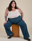 Work Pants in Lagoon and Tank Top in Vintage Tee off-White worn by Sam