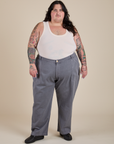 Sam is 5’10” and wearing 4XL Work Pants in Washed Grey paired with Tank Top in Vintage Tee Off-White