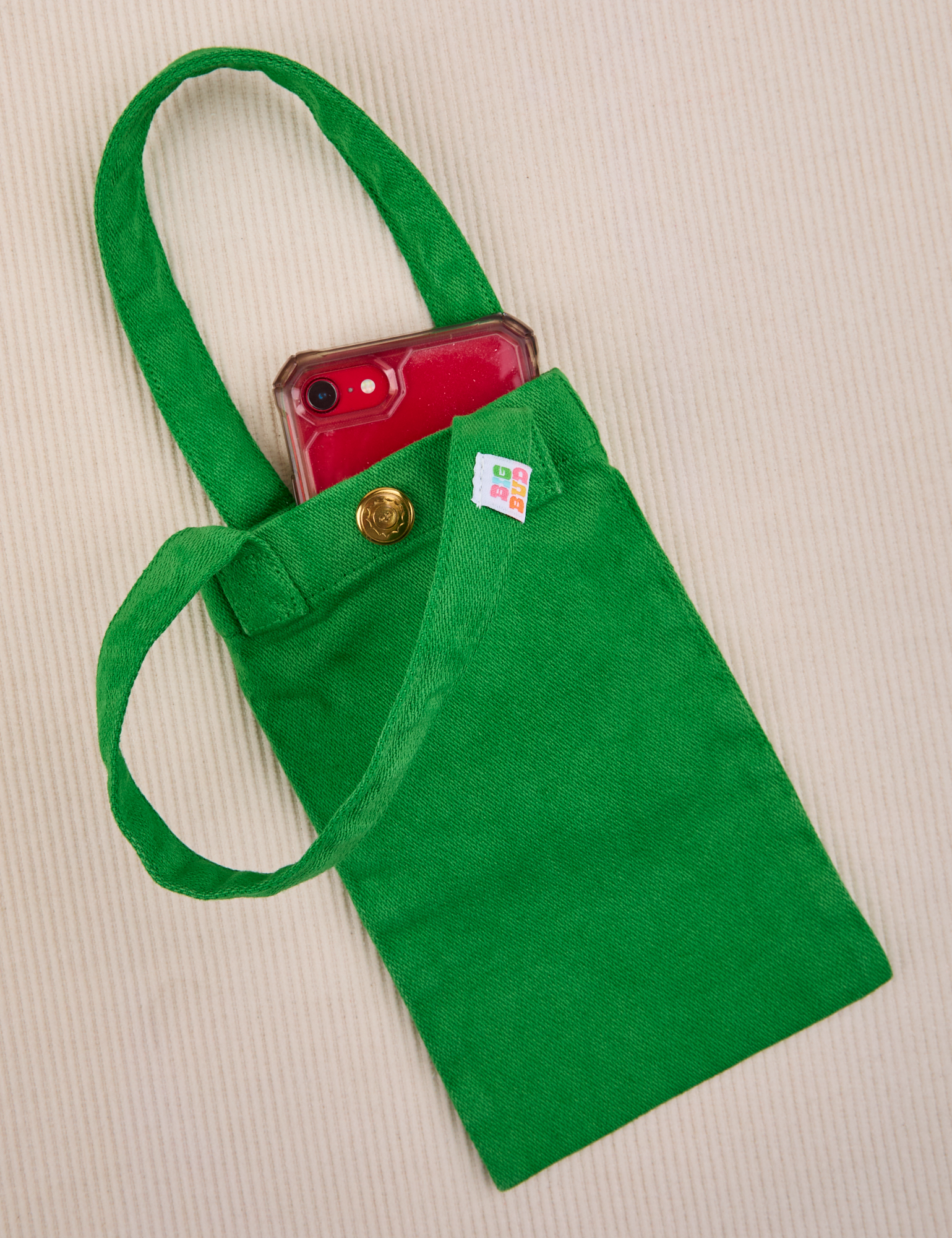 Phone tucked into kelly green Cell Phone Tote
