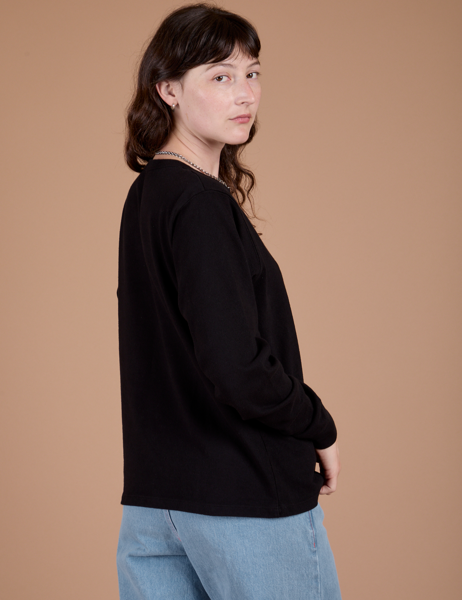 Long Sleeve Burly Tee in Basic Black side view on Alex