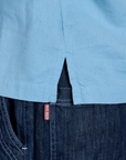 Painted Pantry Button-Up in Baby Blue side vent close up
