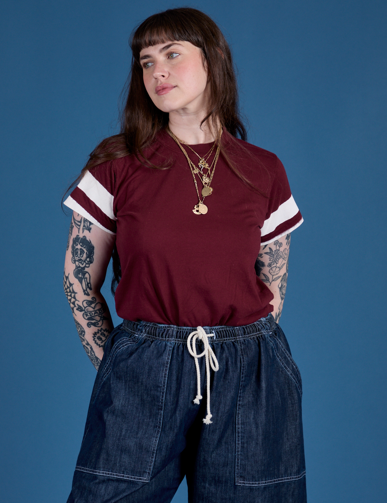 Sydney is wearing Painted Vintage Tee in Red Wine