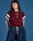 Sydney is wearing Painted Vintage Tee in Red Wine